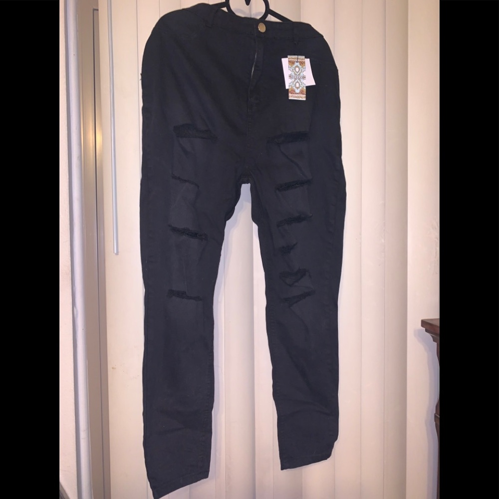Plus size high wasted stretch black destroyed jean